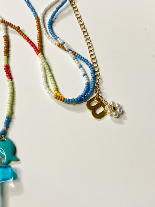 Long Beaded Eclectic Charms Necklace