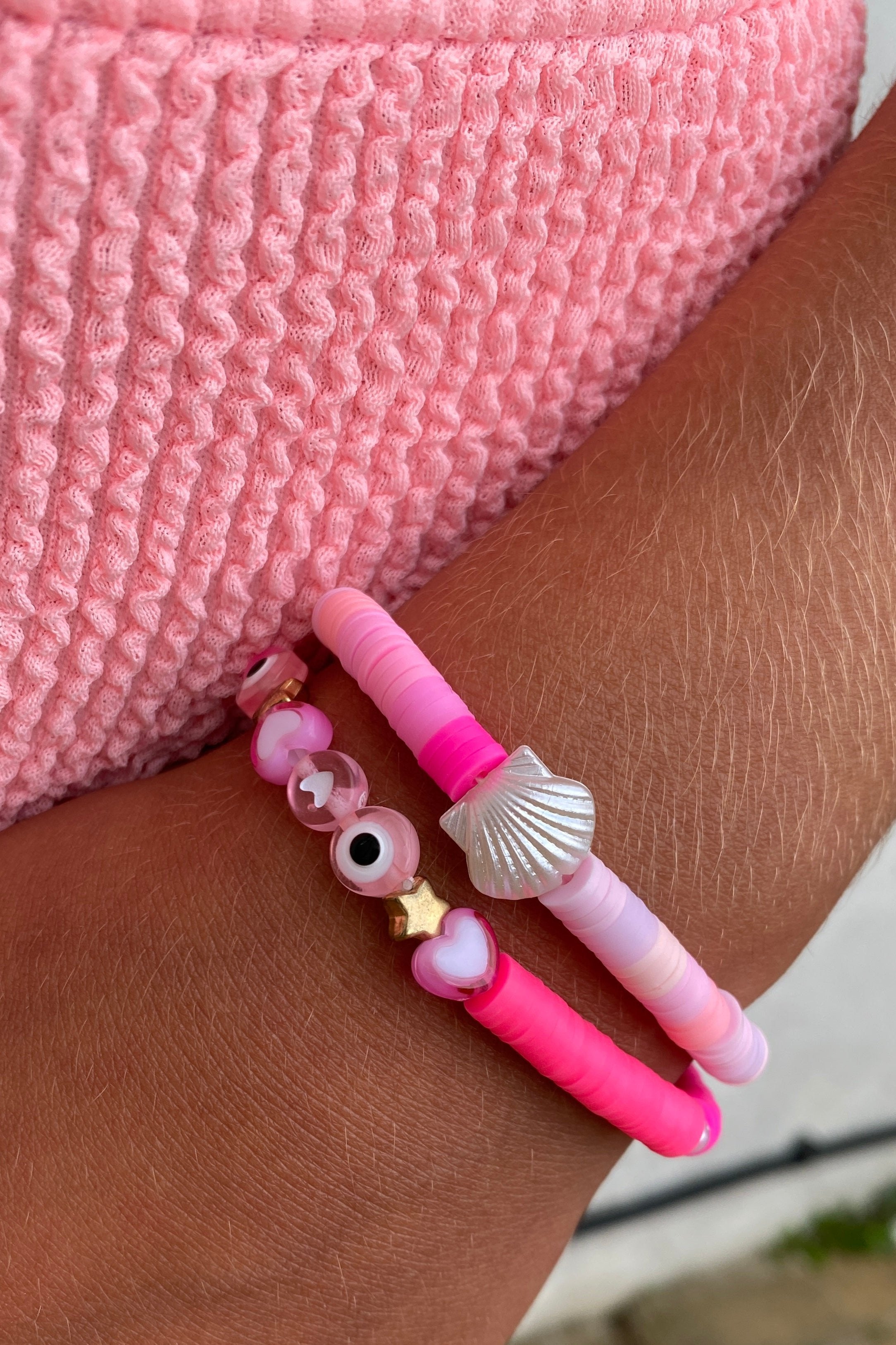 Pulseras de cuentas con mezcla de conchas rosas