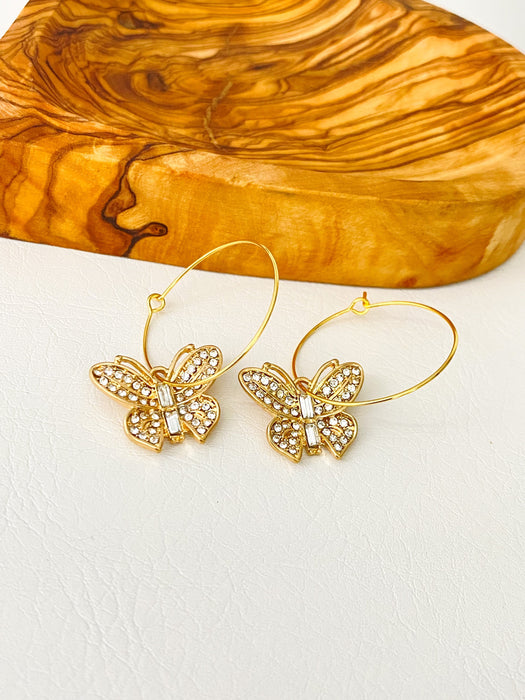 Pendientes de aro con mariposas brillantes