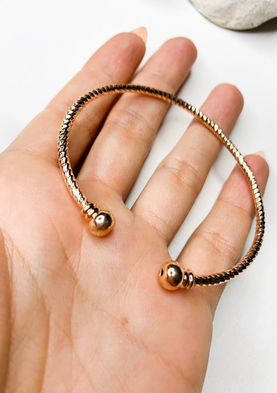 Rose gold hot sale torque bangle